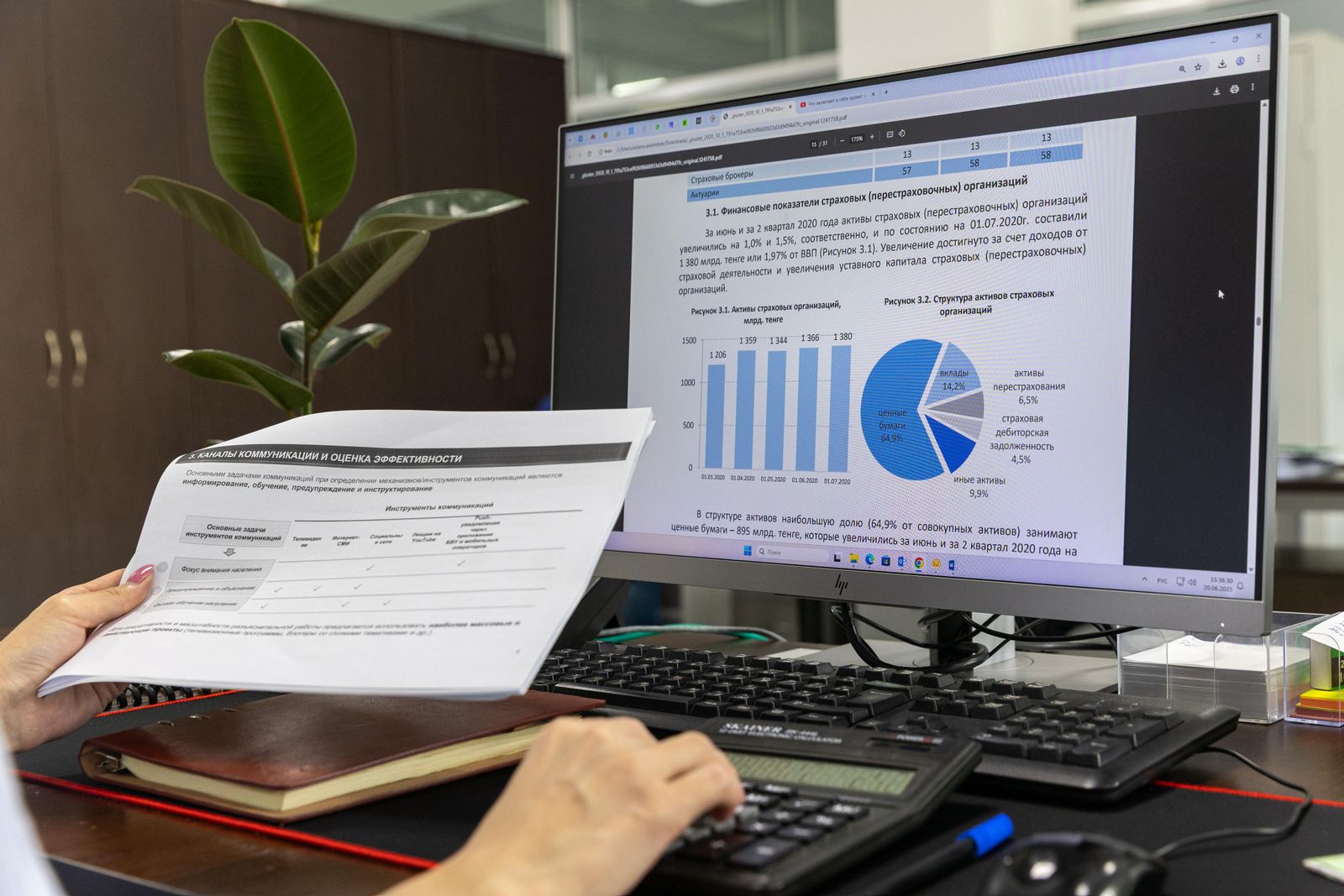 Business data being analysed on a desktop monitor